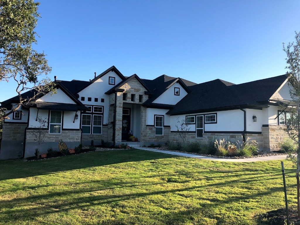 Gutter installation on a limestone and stucco home in San Antonio