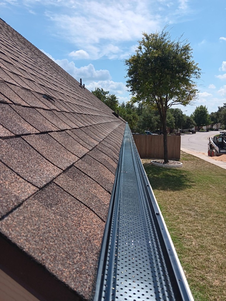Custom seamless gutter craftsmanship on a Highlands Ranch home