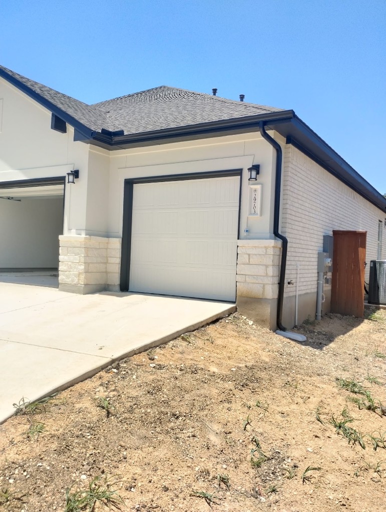 New construction gutter installation on a New Braunfels-area home in Aurora